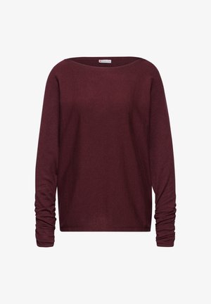 Dlouhý rukáv top v barvě burgundské, s širokým lodičkovým výstřihem a texturovanou látkou. Disponuje nařasenými manžetami pro uvolněný střih.