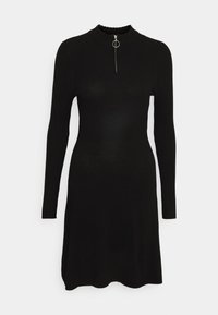 Abito nero a costine con maniche lunghe, colletto alto e dettaglio con zip al collarino, caratterizzato da una leggera silhouette ad A.