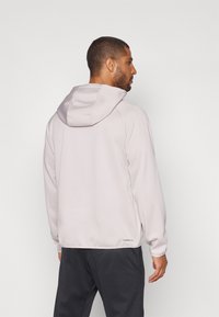 Nike Performance HOODIE - Jersey con capucha - platinum violet/black