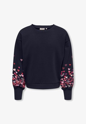 Navyblå sweatshirt med lange ærmer med spredte hjerte-mønstre i pink, rød og lilla på de nederste ærmer samt ribbet manchet og kant.