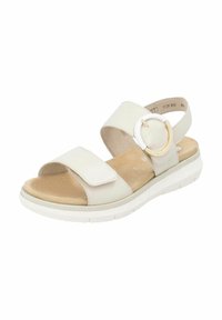Sandales blanches avec deux brides réglables et un accent circulaire doré. Semelle intérieure texturée, semelle rembourrée et semelle en caoutchouc pour une meilleure adhérence.