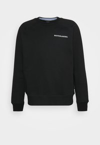 Sudadera negra de mezcla de algodón, con cuello redondo, puños y dobladillo acanalados, y con el logotipo blanco "Scotch & Soda" en el frente.