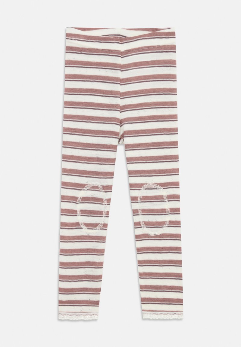 Leggings a rayas en color crema y óxido, con parches en las rodillas, dobladillos de encaje y una textura de tela suave. Diseñados para confort y durabilidad.