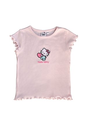 Light pink toddler shirt with ruffled sleeves and hem, featuring a Hello Kitty character holding a heart and the text "Hello Kitty" below.