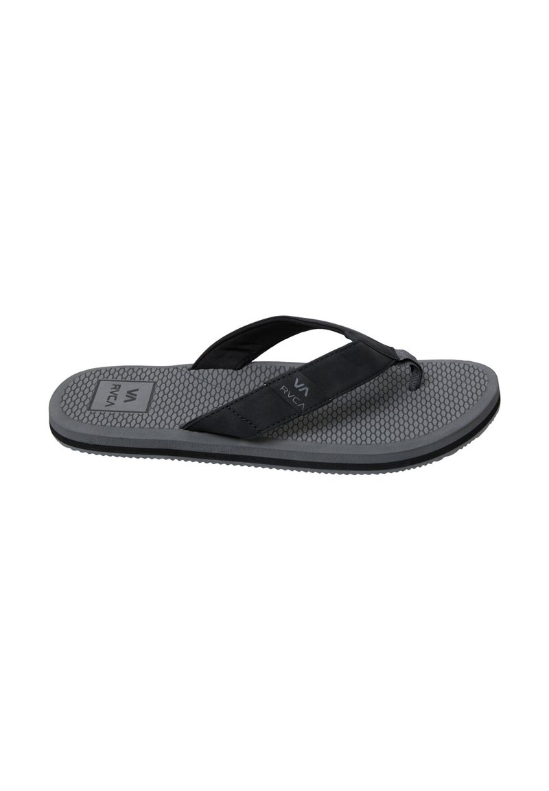 Black flip-flop sandal with a textured gray sole, characterized by a wide strap and lightweight design, featuring a honeycomb pattern.