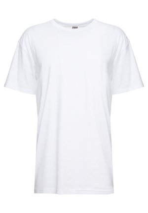 Fehér pamut póló kerek nyakkal és rövid ujjakkal. Az anyaga sima, lazán illeszkedik, és nincsenek rajta látható grafikák vagy minták.