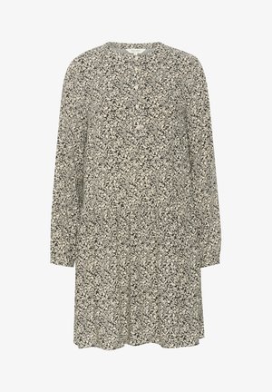 Dolga obleka z dolgimi rokavi v črno-belem cvetličnem vzorcu, z okroglim ovratnikom in sproščenim krojem. Narejena iz lahkega teksturiranega blaga.