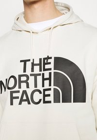 The North Face Jersey con capucha - white