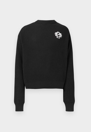 Black cropped sweater made of ribbed knit fabric, featuring long sleeves and a white embroidered logo on the upper back.
