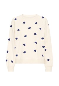 Pullover beige chiaro con motivi a cuore blu navy. Caratterizzato da collo a giro, maniche raglan e polsini a costine. Tessuto morbido e testurizzato.