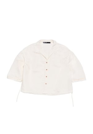 White button-up shirt with short sleeves, soft texture, collar, and five buttons down the front, featuring drawstrings at the hem.