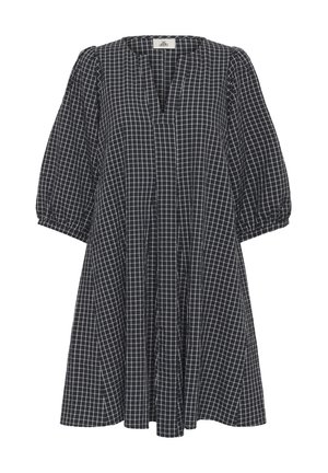 Robe à carreaux noirs et blancs avec décolleté en V, manches bouffantes et coupe ample avec plis du bustier à l'ourlet.