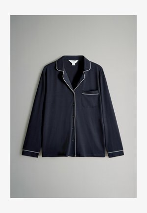 Tummansininen pitkähihainen pyjama paita, joka on valmistettu pehmeästä kankaasta. Paidassa on valkoiset viikset kauluksessa,taskussa ja hihoissa, sekä nappikiinnitys edessä.