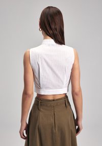 adL CROP beżowy