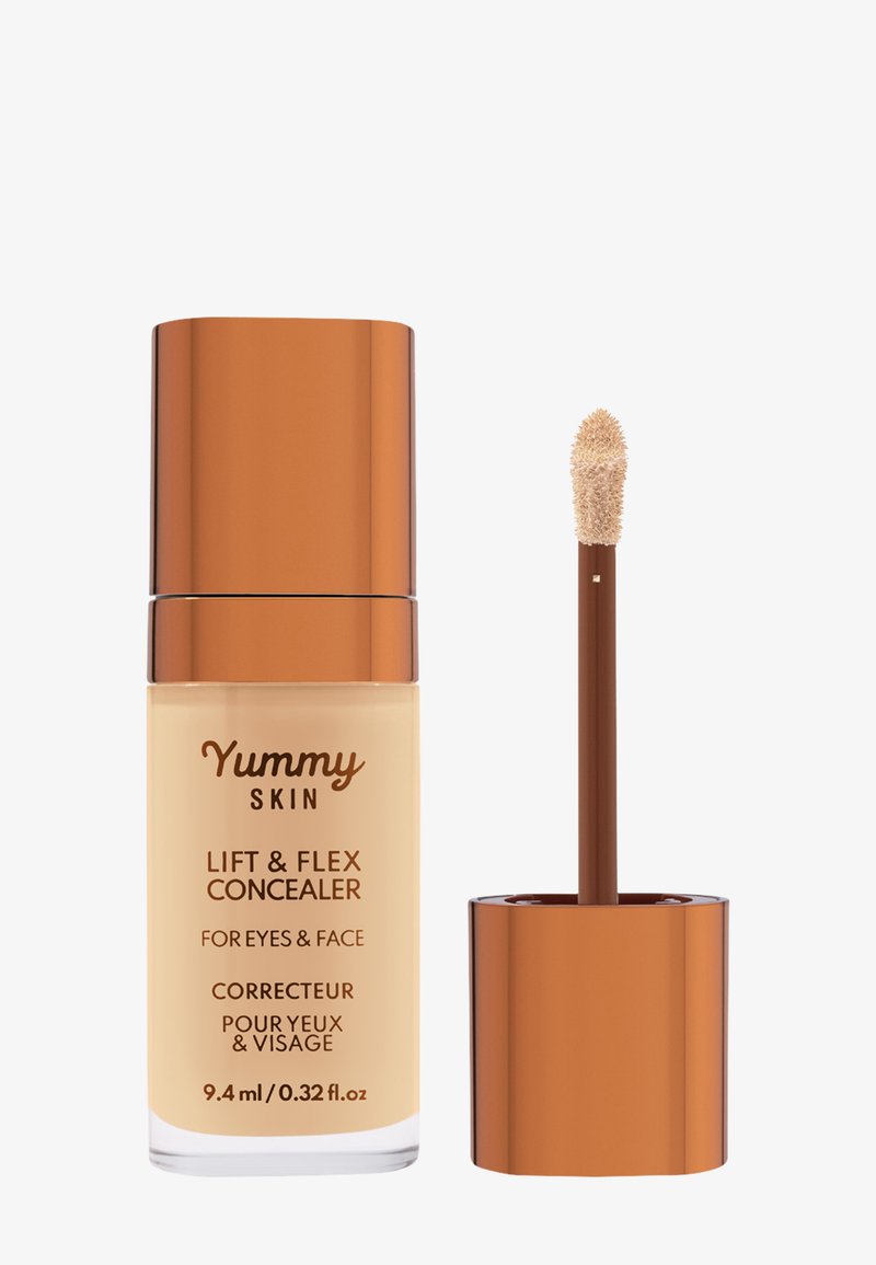 Lift & Flex Concealer pakkauksessa on kirkas pullo ja kultainen korkki. Sisältää sienenpäällysteisen applikaattorin. Kermainen neste, vaaleanbeige sävy.