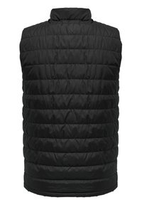 Svart vadderad väst med hög krage. Har en lätt vadderad yta och ingen synlig hårdvara. Slät utsida med en figurnära design.