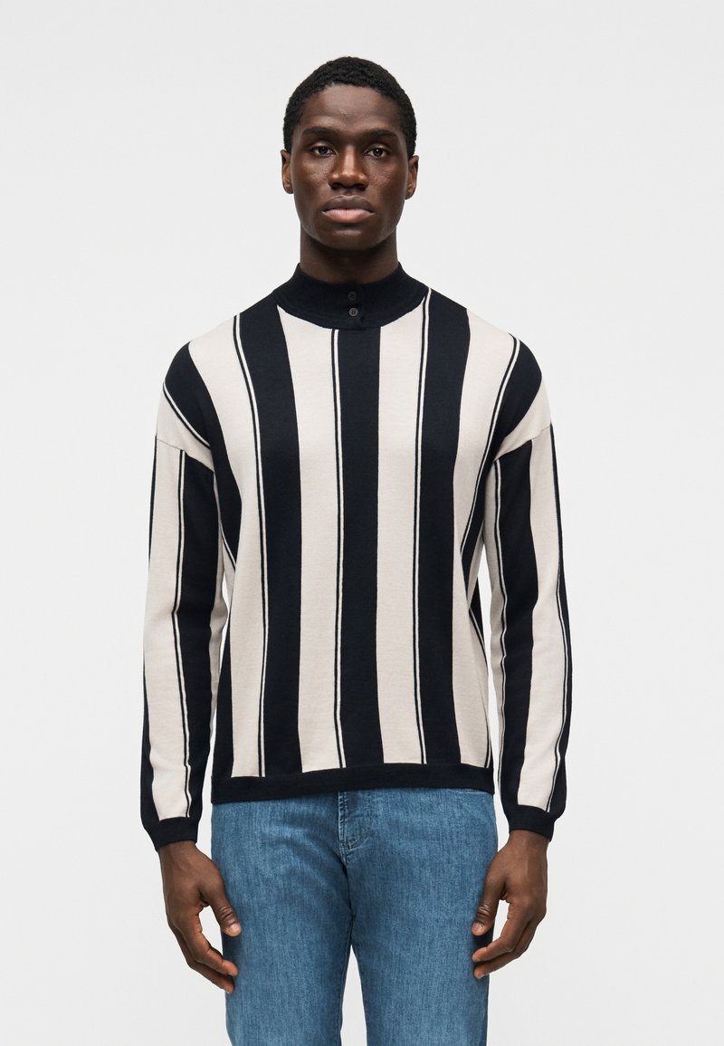 Pull-over à col avec motif rayé beige et marine, manches longues et patte à trois boutons. Tissu tricoté doux et texturé.