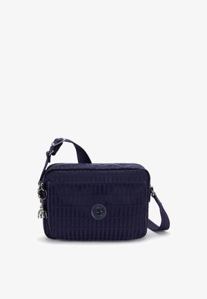 Navy rectangular crossbody bag made of textured fabric, featuring a zip closure, adjustable strap, and a logo accent on the front.
