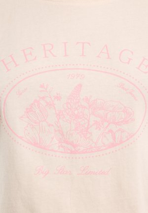 Kremowa bawełniana koszulka z różowym, kwiatowym wzorem oraz napisem "HERITAGE", "1979" i "Big Star Limited" w owalnym wzorze.