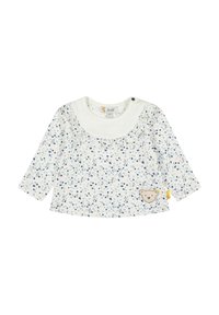 Top a maniche lunghe di colore crema con stampa floreale in blu e rosa. Presenta un colletto arricciato e una toppa di un orso ricamata sul davanti.