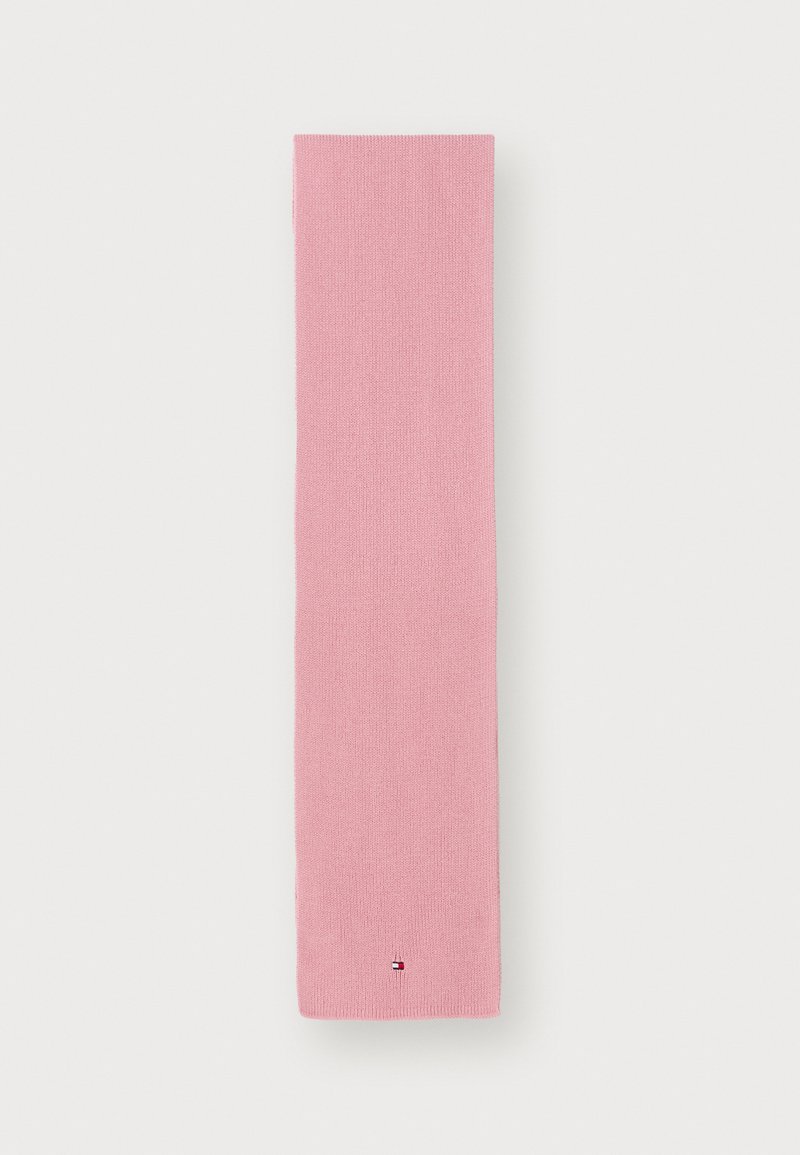 Pink knitted scarf, rectangular shape, smooth texture, featuring a small multicolored logo detail near the bottom.