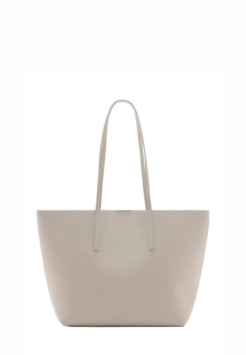 Sac fourre-tout en cuir beige avec de longues poignées doubles, texture lisse et un design simple, sans ornement.