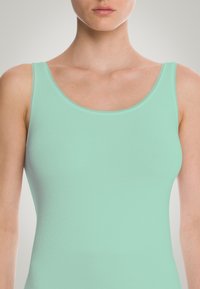 Wolford JAMAIKA SINGLET - Linne - icy mint