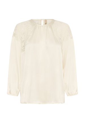 Krém színű hosszú ujjú blúz csipkés vállrészletekkel, ráncolt nyakkivágással, gumis ujjvégekkel és hátul gombos záródással.