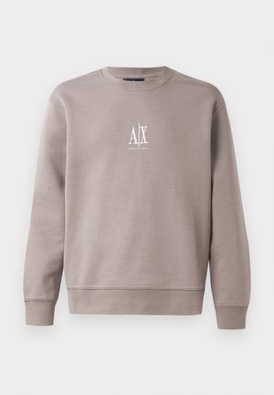 Grauer Pullover aus weichem Material mit Rundhalsausschnitt, langen Ärmeln und kleinem weißen Logo auf der Brust.