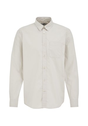 Camicia a maniche lunghe color beige chiaro, con colletto, taschino sul petto e texture di cotone liscia, caratterizzata da dettagli con bottoni lungo la parte anteriore.