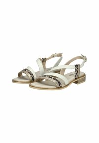 Open-toed sandals featuring a mix of white leather and animal print design, with a low, stacked heel and adjustable ankle strap.