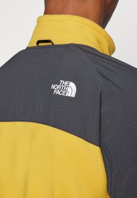 The North Face GLACIER HEAVYWEIGHT FULL ZIP - Fleece jacket - turmeric/asphalt grey/black