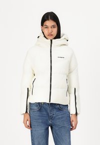 White quilted puffer jacket with a hood, featuring black zippers, side pockets, and a logo on the chest; smooth texture.