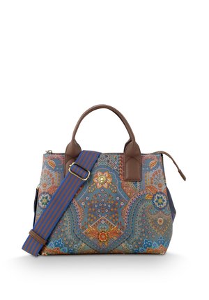 Fabric handbag with a paisley pattern in blue and earthy tones. Brown leather accents. Comes with a striped blue and brown adjustable strap.