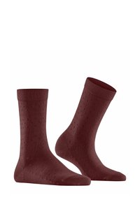 Burgunderfarbene Socken mit einem strukturierten Muster, ausgestattet mit einem gerippten Bund und einer glatten Oberfläche. Entworfen für Komfort und Langlebigkeit.