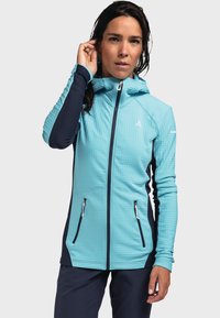 Leichte, kapuzierte Jacke in strahlendem Türkis mit strukturiertem Muster, marineblauen Ärmeln, durchgehendem Reißverschluss und zwei Reißverschlusstaschen.