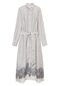 Abito midi bianco a maniche lunghe con pois neri, apertura frontale con bottoni, cintura in vita e motivo floreale paisley nero lungo l'orlo.