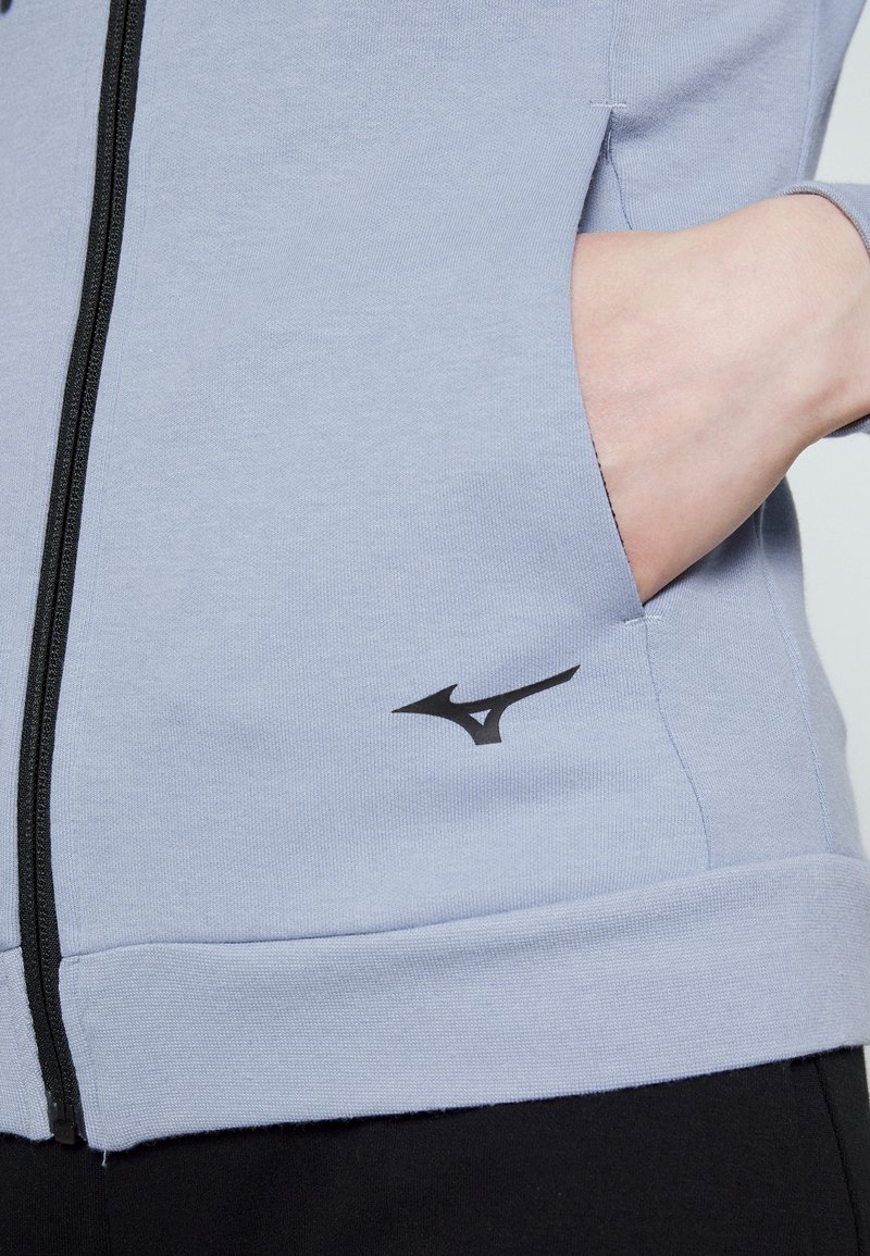 Damen Sportbekleidung | Mizuno ATHLETIC JACKET Trainingsjacke blue blizzard/blau - JN30841 Damen Sportbekleidung | Mizuno ATHLETIC JACKET Trainingsjacke blue blizzard/blau - JN30841