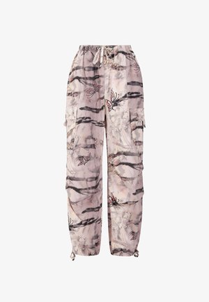 Cargo pants in a soft pink fabric with butterfly and floral patterns, featuring black stripes, adjustable waistband, and side pockets.