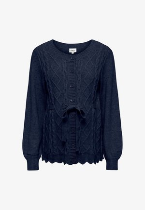 Tummansininen neulejakku, jossa on kaapeli-neulekuvio, pyöreä pääntie, nappikiinnitys ja solmukohta vyötäröllä. Aaltomaisesti viimeistelty helma.