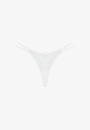 White thong underwear with lace trim. Features thin straps and a small gold accent in the center. Made from a smooth, stretchy material.