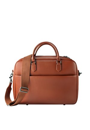 Brown leather briefcase with dual handles, a detachable strap, and a front pocket. Smooth texture with subtle stitching details.