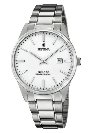Montre en acier inoxydable argenté avec un cadran blanc, des index horaires et une fenêtre de date à 3 heures. Design de bracelet avec maillons polis.
