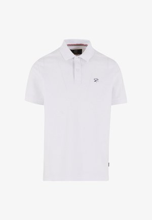 Bjela kratka polo majica s kratkim rukavima s dva gumba, malim izvezenim logotipom i natpisom "EST. 1983" na lijevom dijelu prsnog koša.