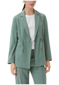 Lichtgroene, op maat gemaakte blazer met een trekkoorddetail in de taille, twee zijzakken en een notch revers. Zachte stof met een gladde textuur.