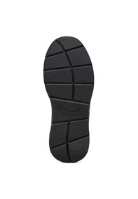 Black rubber shoe sole with textured grip, featuring a segmented pattern and a logo at the center. Overall shape is slightly rounded.