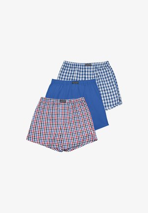 Drei Paare Herren-Boxershorts mit elastischem Bund, zwei mit karierten Mustern in Blau und Rot und ein einfarbig blau, überlappend angeordnet.