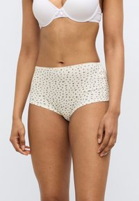 Μπεζ εσώρουχο ψηλόμεσο με μικρό μπλε ανθικό μοτίβο, ριμπ υφή και κυματιστό τελείωμα γύρω από τη μέση.