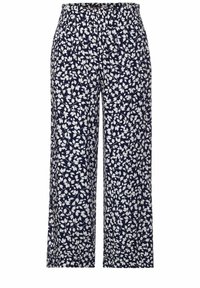 Kalhoty širokého střihu s námořnickým vzorem a bílým listovým designem. Elastický pás, lehká tkanina a splývavý siluet pro pohodlí.