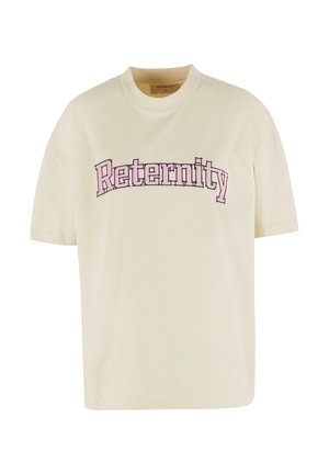 Cream-colored t-shirt made from cotton, featuring a crew neck and short sleeves. The front has pink text that reads "Reternity."